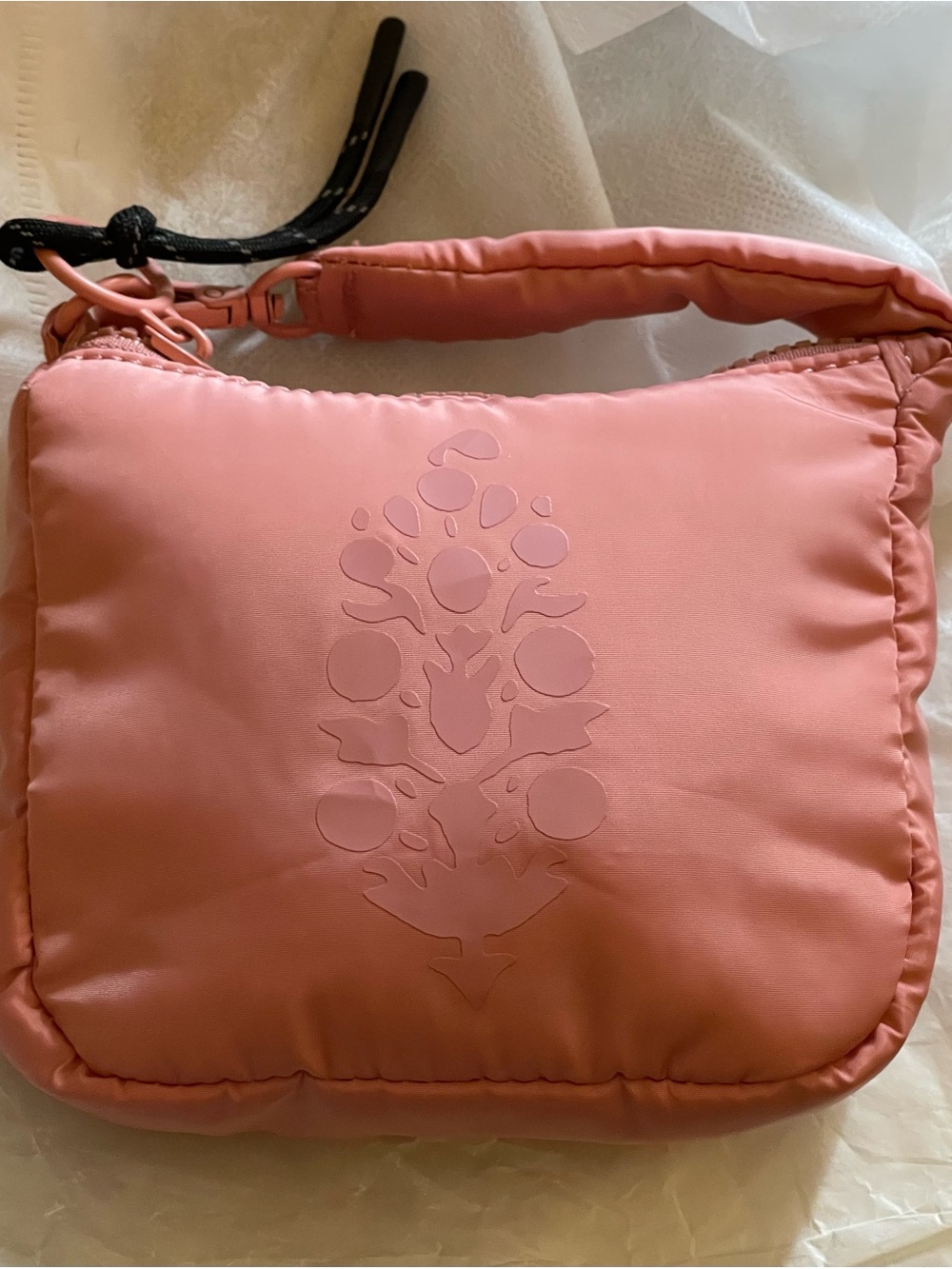 NWOT free people pink, quilted micro pouch  with lobster clasp with large logo